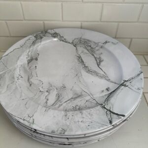 8 Tommy Bahama melamine plates.